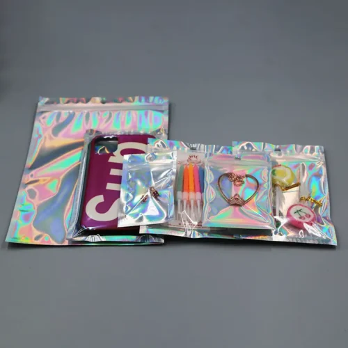 Holographic clear stand-up resealable zipper pouches for jewelry, stylish and durable, perfect for packaging and displaying accessories. Secure, eye-catching design.